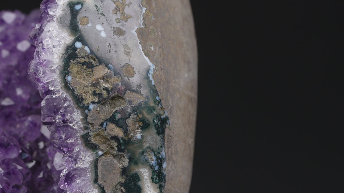 Amethyst geode with stalactite flower on stand